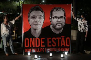 Employees of the National Indigenous Foundation protest over missing British journalist Dom Phillips and Brazilian Indigenous affairs specialist Bruno Pereira, in Brasilia, on June 9, 2022