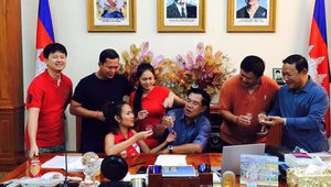 Hun Sen posts a picture of him and his children and chidlren-in-law in his office. Posted in response to the launch of Hostile Takeover on 7th July. 