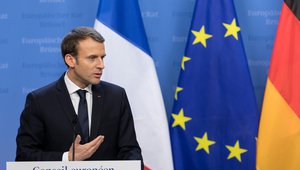 Macron addresses a media conference at an EU summit