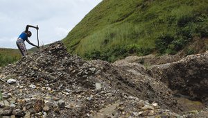 Miner clearing detritus DRC