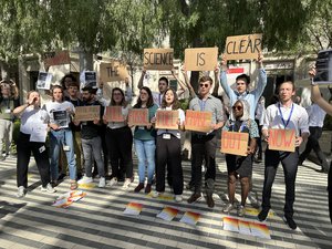 Fossil Fuel action at COP28 - signs
