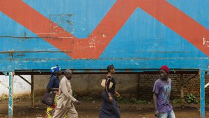 People walk down a street in Bukavu, South Kivu province, in the east of the Democratic Republic of the Congo on April 2, 2015