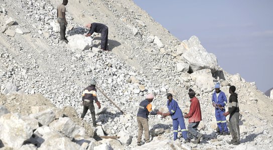 Workers pick lithium at Sandawana Mines in Mberengwa Zimbabwe 26 July 2023